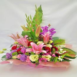 ミックス系 ピンクユリと蘭を使った豪華アレンジメント